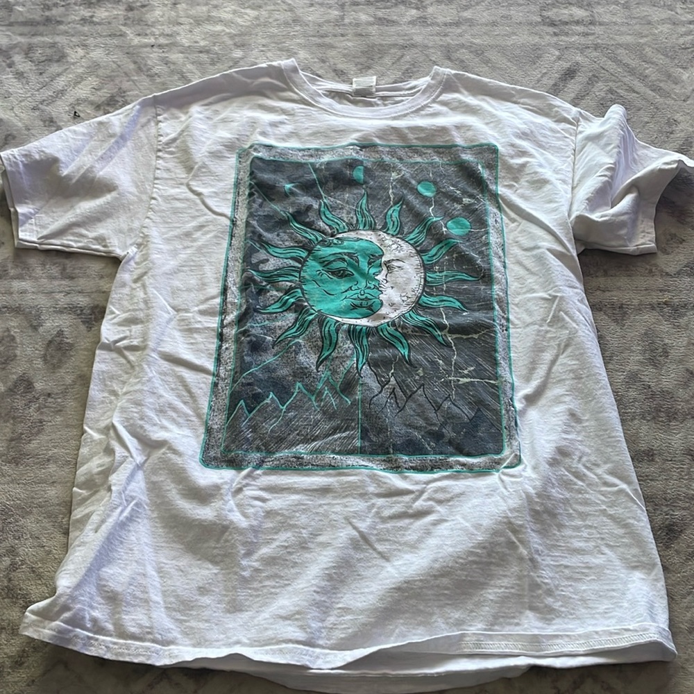 Medium white T shirt with sun/moon picture on front